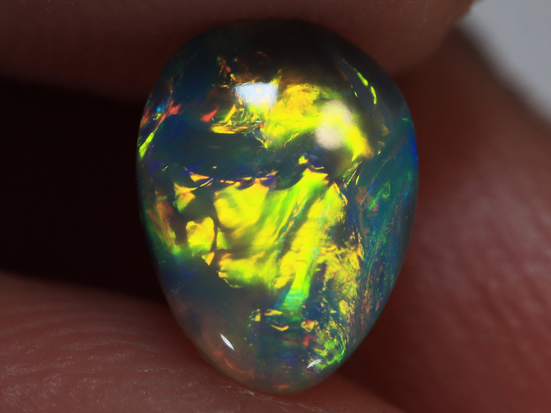 0.55 Ct. Lightning Ridge Golden flashing Black Opal TOG-1211